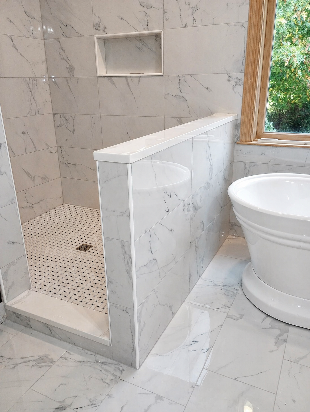 Bathroom with freestanding bathtub