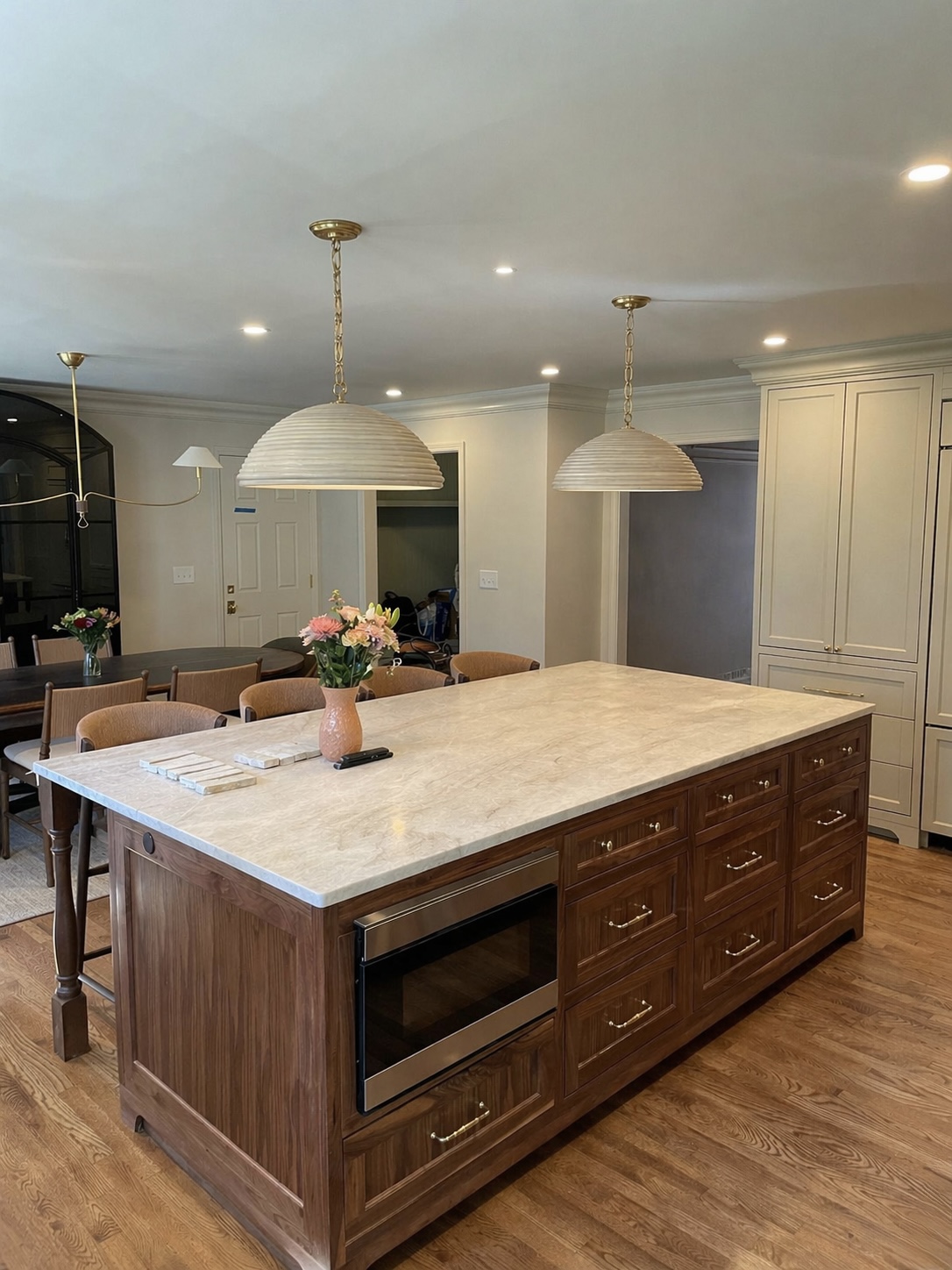 Custom kitchen island with solid countertop built by Design Carpenter